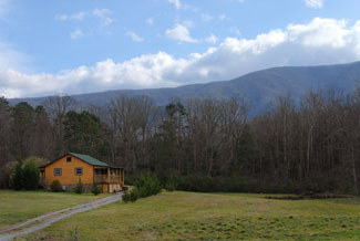 Pigeon Forge One Bedroom Cabin Rental with Pool Table, Hot Tub, Flat Screen TV, and a Gas Fireplace